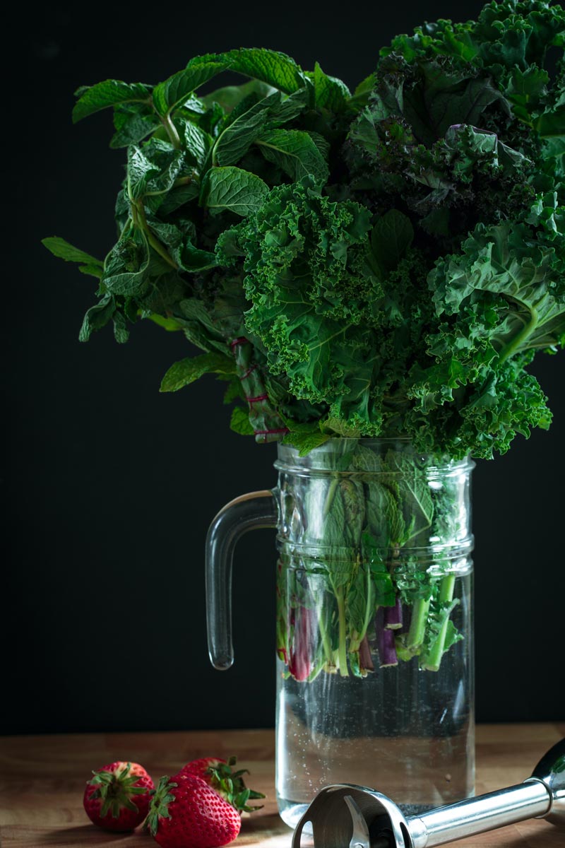 Fresh kale in a pitcher of water to keep it fresh