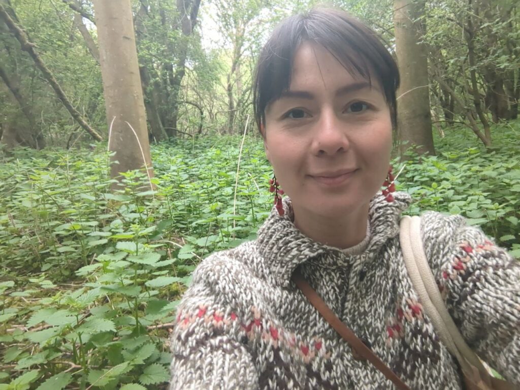 Emma Johns foraging for stinging nettles. 